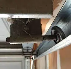 Broken Garage Door Roller By Master Pro Garage Door in Maryland